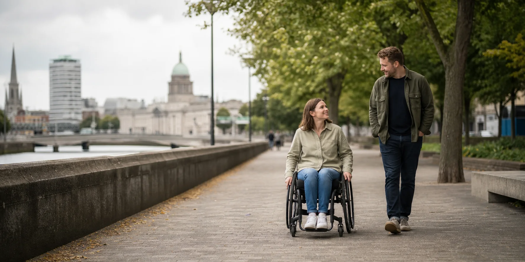 A wheelchair user taking part in community life with a support companion